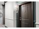 This hallway features neutral colors, dark trim, and several doors to resident's apartments at 901 Abernathy Ne Rd # 5140, Sandy Springs, GA 30328