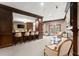 Lounge area with bar, comfortable seating, fireplace, and convenient access to outdoor area at 901 Abernathy Ne Rd # 5140, Sandy Springs, GA 30328