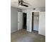 Bedroom featuring gray walls and carpet flooring, with two doorways and a closet at 108 Countryside Se Pl, Smyrna, GA 30080