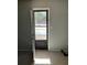 Bedroom with gray walls and an open door to a balcony space at 108 Countryside Se Pl, Smyrna, GA 30080