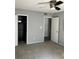 Bedroom featuring gray walls and carpet flooring, with two doorways at 108 Countryside Se Pl, Smyrna, GA 30080