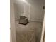 Bedroom with neutral carpet, walls, and a door to the exterior at 108 Countryside Se Pl, Smyrna, GA 30080