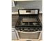 Kitchen features a Whirlpool gas range oven with stainless steel details at 108 Countryside Se Pl, Smyrna, GA 30080