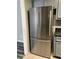 Modern stainless steel refrigerator complements gray cabinets and stylish design elements at 108 Countryside Se Pl, Smyrna, GA 30080