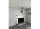 Living room showing the fireplace and wood-look floors at 108 Countryside Se Pl, Smyrna, GA 30080