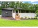 Inviting screened porch with a ceiling fan, perfect for outdoor relaxation at 1326 Stella Sw Cir, Mableton, GA 30126