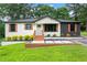 Charming single-story home with a well-manicured lawn, and freshly painted exterior at 1326 Stella Sw Cir, Mableton, GA 30126
