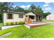 Well-maintained single-story home with lawn, newly painted exterior and welcoming front entrance at 1326 Stella Sw Cir, Mableton, GA 30126