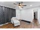 Cozy living room with lots of light and hardwood floors, offering comfortable seating at 1326 Stella Sw Cir, Mableton, GA 30126