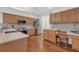 Updated kitchen with stainless steel appliances, shaker cabinets, a tile backsplash, and lots of counter space at 1402 Silver Summit Se Dr, Conyers, GA 30094
