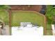 Aerial view showcases the fenced backyard and patio at 2220 Meadowvale Ne Dr, Atlanta, GA 30345