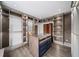 Custom walk-in closet featuring a center island and custom closet organizers at 2220 Meadowvale Ne Dr, Atlanta, GA 30345