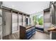 Custom walk-in closet featuring a large window, center island, and custom shelves at 2220 Meadowvale Ne Dr, Atlanta, GA 30345