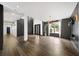Spacious entryway featuring modern accents, stylish lighting, and hardwood flooring at 2220 Meadowvale Ne Dr, Atlanta, GA 30345