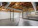 Spacious unfinished basement featuring concrete floor, exposed ceiling, and storage shelving at 3013 Huntshire, Doraville, GA 30340