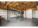 Unfinished basement with exposed ceiling, support beams, and concrete flooring, great for storage at 3013 Huntshire, Doraville, GA 30340