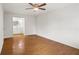 Bedroom with hardwood floors leading to bathroom at 3013 Huntshire, Doraville, GA 30340