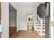 Bright foyer featuring tile flooring, stairs, and open access to other rooms at 3013 Huntshire, Doraville, GA 30340