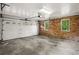 Spacious garage with windows and brick accent wall at 3013 Huntshire, Doraville, GA 30340