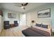 Serene bedroom with a ceiling fan, a modern bed, and tasteful decorative accents at 3160 Ann Se Rd, Smyrna, GA 30080