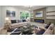 Inviting living room with a cozy fireplace, stylish decor, and ample natural light at 3160 Ann Se Rd, Smyrna, GA 30080