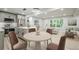 Open-concept living space featuring a kitchen, dining area, and comfortable seating at 3160 Ann Se Rd, Smyrna, GA 30080