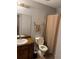 Functional bathroom with a vanity sink, toilet, and shower-tub combination at 4798 Mary Dale Ct, Lilburn, GA 30047