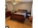 Comfortable bedroom with a queen bed, dresser, and stylish decor at 4798 Mary Dale Ct, Lilburn, GA 30047