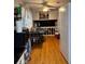 Eat-in kitchen with hardwood floors and bright natural light at 4798 Mary Dale Ct, Lilburn, GA 30047