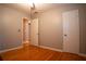 Bedroom with hardwood floors, two closets and ample natural light at 4798 Marydale Sw Ct, Lilburn, GA 30047