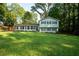 Charming two-story home with black shutters and a spacious front yard at 4798 Marydale Sw Ct, Lilburn, GA 30047