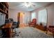 View of the living room area featuring hardwood floors, a ceiling fan, and nice furnishings at 4798 Marydale Sw Ct, Lilburn, GA 30047