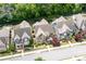 Aerial view of the home showcasing mature trees, landscaping and neighborhood streets at 238 Avery Ne St, Marietta, GA 30060
