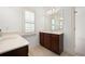 Bright bathroom featuring a double vanity and tile flooring at 238 Avery Ne St, Marietta, GA 30060
