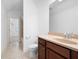 Bathroom vanity with tiled floors and a shower/tub combo at 238 Avery Ne St, Marietta, GA 30060
