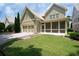 Charming home with a screened porch, attached garage and manicured lawn at 238 Avery Ne St, Marietta, GA 30060