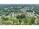 An aerial view of a residential neighborhood with tree-lined streets and well-maintained homes at 2711 Bethesda Ne Ct, Lawrenceville, GA 30044