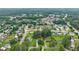 An aerial view of a residential neighborhood with tree-lined streets and well-maintained homes at 2711 Bethesda Ne Ct, Lawrenceville, GA 30044