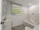 Bathroom with tub/shower combo and vanity at 2711 Bethesda Ne Ct, Lawrenceville, GA 30044