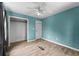 Bedroom with closet, door, and a window for natural light and ventilation at 2711 Bethesda Ne Ct, Lawrenceville, GA 30044
