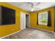 Bedroom featuring a chalkboard wall and large window at 2711 Bethesda Ne Ct, Lawrenceville, GA 30044