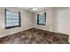 Bedroom featuring unique checkered floors and a door at 2711 Bethesda Ne Ct, Lawrenceville, GA 30044