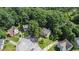 Aerial view of a cul-de-sac featuring a home with a large, tree-filled private backyard at 3440 Oaktree Way, Stonecrest, GA 30038