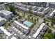 Aerial view of townhome community featuring a pool, green space, and on-street parking at 1066 Brandsford Nw St, Atlanta, GA 30318