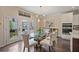 Bright dining room with glass table, and french doors leading to a balcony at 1066 Brandsford Nw St, Atlanta, GA 30318