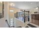 Home entryway and dining area featuring hardwood floors and iron banister and natural light at 1066 Brandsford Nw St, Atlanta, GA 30318