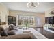 Comfortable living room featuring hardwood floors, recessed lighting, and a modern entertainment center at 1066 Brandsford Nw St, Atlanta, GA 30318