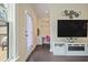 View of living room with access to a home office space and outdoor deck at 1066 Brandsford Nw St, Atlanta, GA 30318
