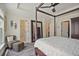Spacious main bedroom featuring a four-poster bed, carpeted floors, and ensuite access at 1066 Brandsford Nw St, Atlanta, GA 30318
