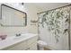 Charming bathroom with a shower and tub combination, a decorative shower curtain, and ample counter space at 2084 Del Lago Nw Cir # 1, Kennesaw, GA 30152